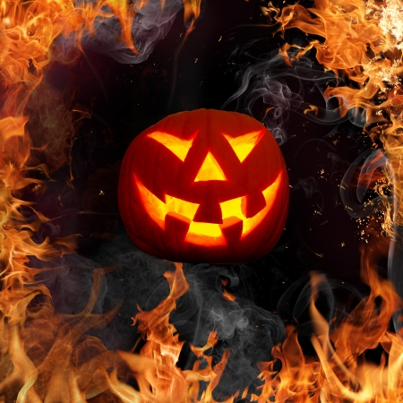 Scary Halloween background with fire flamesの写真素材