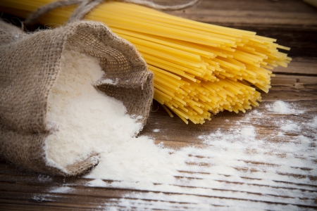 Spaghetti on wooden tableの写真素材