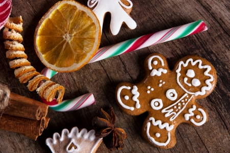 Traditional gingerbread cookies over wooden background