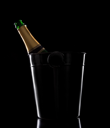 Champagne bottle over black backgroundの写真素材
