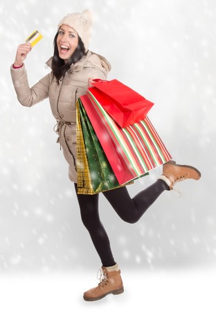Christmas Shopping  Happy Woman with Shopping Bags の写真素材