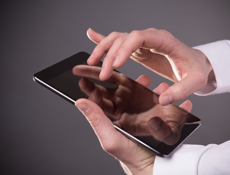 hand touching digital tablet, modern technology concept