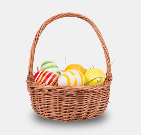 Easter eggs and basket isolatedの写真素材