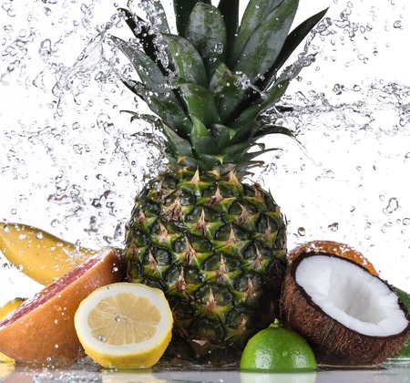 Fresh fruit with water splashの写真素材