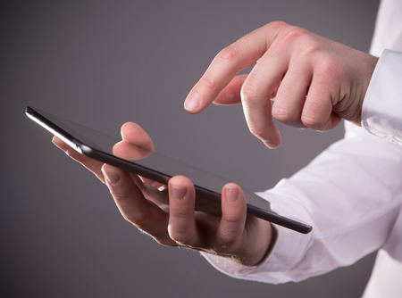 hand touching digital tablet, modern technology concept