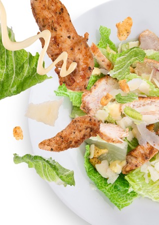 Caesar salad with chicken and greens の写真素材