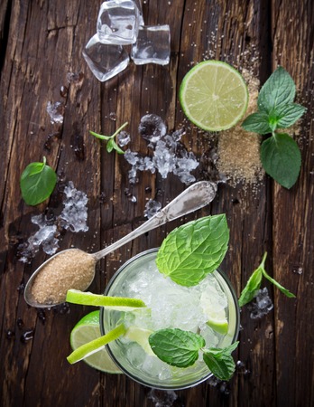 Fresh mojito drink on wooden tableの写真素材