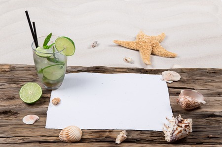 Beach background with blank paper.の写真素材