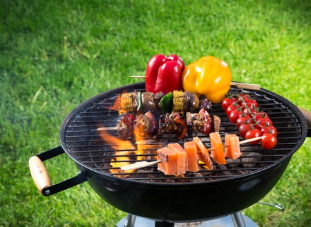 Tasty skewers on the grill, close-up の写真素材