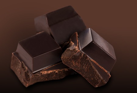Dark chocolate bars on a white backgroundの写真素材