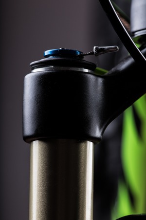 close-up of a mountain bike spring fork, studio shot.の写真素材