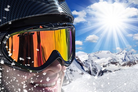 Skier in high mountains during sunny day.の写真素材