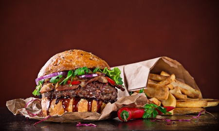 Delicious hamburger on dark backgroundの写真素材