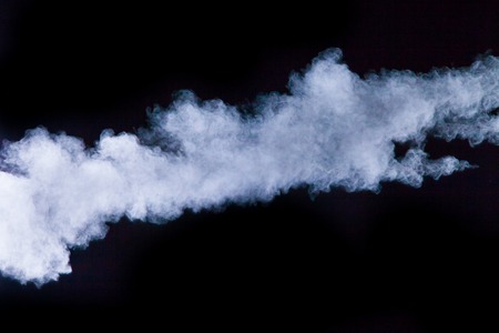 Launched colorful powder, isolated on black backgroundの写真素材