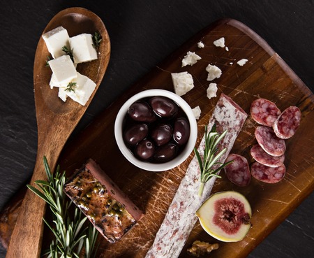 Various types of cheese on stone table, still-life.の写真素材