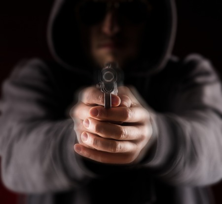 Murderer with handgunの写真素材