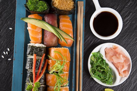 Japanese seafood sushi set on black stone backgroundの写真素材