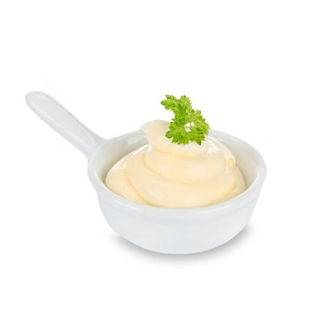 Mayonnaise in bowl on white background.の写真素材