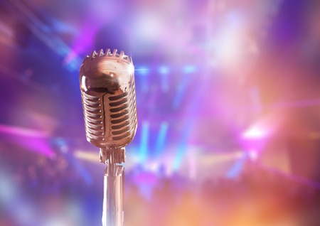 Retro microphone against colourful backgroundの写真素材