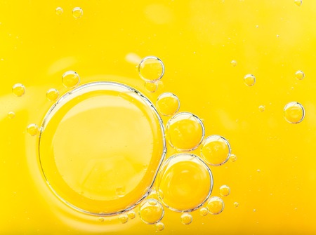 Oil on water surface, close-up.の写真素材