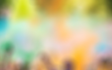 Close-up of marathon, people covered with colored powder, defocused.の写真素材