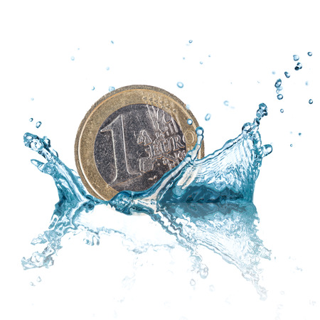 Euro coin with water splash isolated on white background.の写真素材