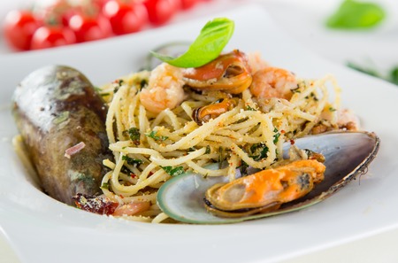 Italian pasta aglio olio frutti di mare, close-up.の写真素材