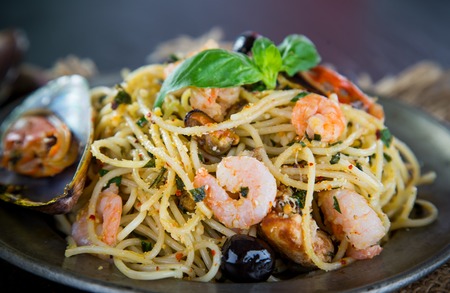 Italian pasta aglio olio frutti di mare, close-up.の写真素材