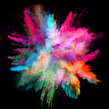 Launched colorful powder, isolated on black background