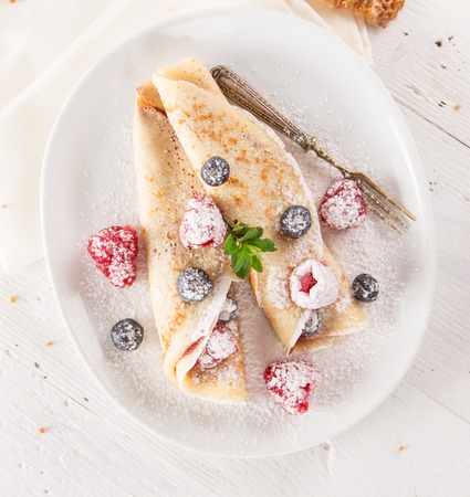 Tasty pancakes with fresh berries, close-up.の写真素材