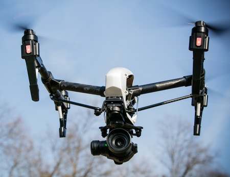 Drone with 4K camera flying, close-up.