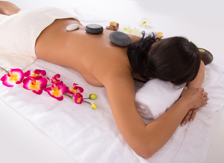 Young beautiful brunette woman getting spa procedures.の写真素材