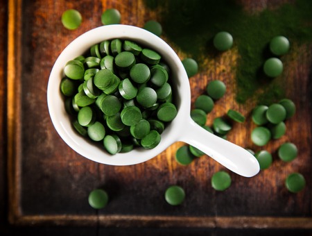 Healthy green young barley and chlorella, close-up.の写真素材