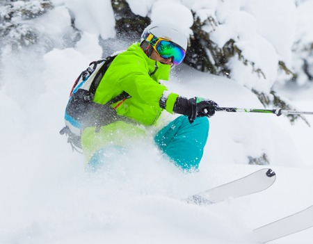 Freeride in fresh powder snow. Skiing.の写真素材