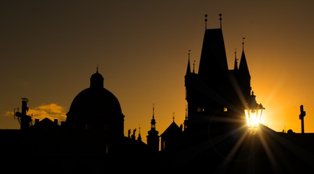 Charles bridge in Prague during morning sunset.の写真素材