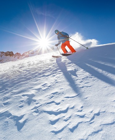 Freeride in fresh powder snow.の写真素材