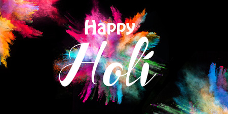 Colored powder explosion on black background.の写真素材