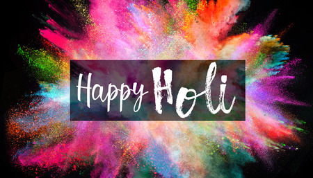 Colored powder explosion on black background.の写真素材