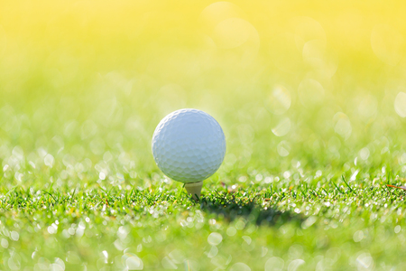 Close up of golf ball on teeの写真素材