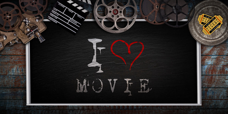 Black board with old vintage movie tools.の写真素材