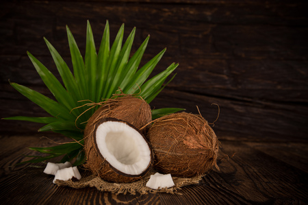 close-up of a coconuts on old wooden background