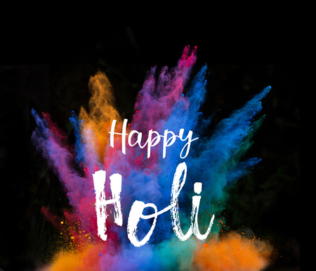 Colored powder explosion on black background.の写真素材