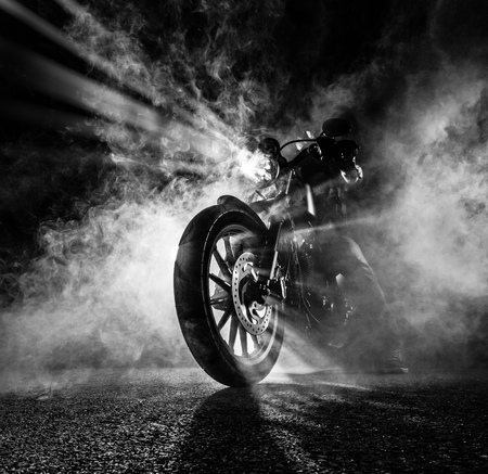High power motorcycle chopper at night.の写真素材