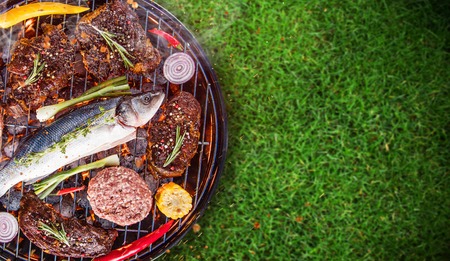 Barbecue garden grill with sea fishe, close-up.の写真素材