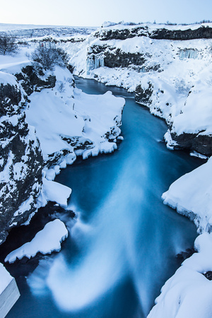 Hraunfossar waterfall in winter. One of the most popular waterfall in Iceland, Europe.の写真素材