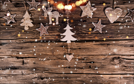 Christmas decoration on wooden background, lots of copy space for your product or text.の写真素材
