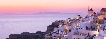 The famous sunset at Santorini in Oia villageの写真素材