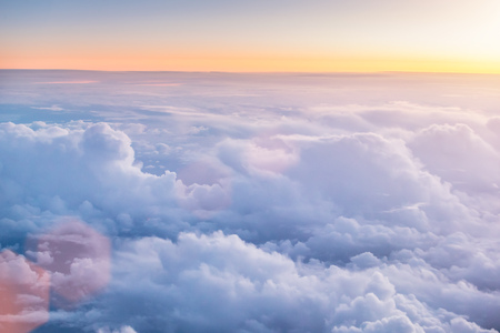 Bird eye view of clouds. Shot from airplane window.の写真素材