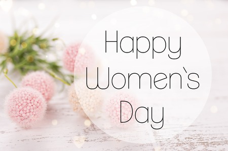 Flowers composition for Womens Day. Pink flowers on old white wooden background.の写真素材