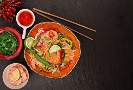 Various of asian meals on rustic background , top view , place for text. Asian food concept.